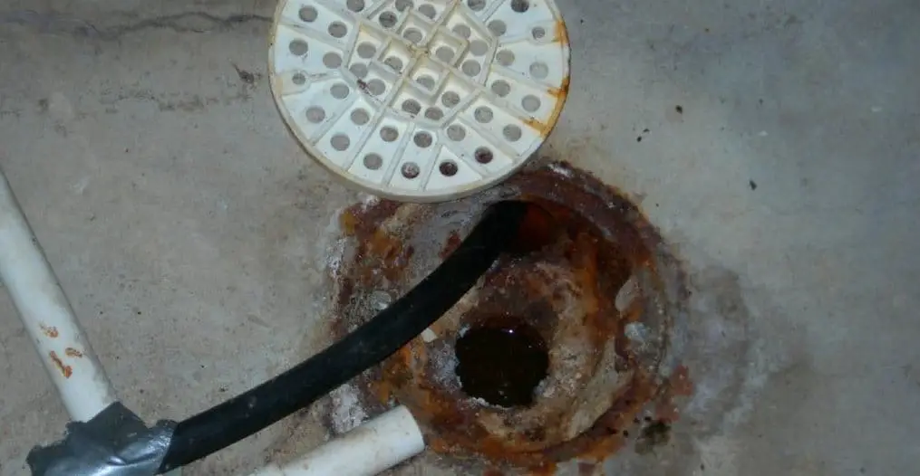 Can you drain your utility sink in the ground?